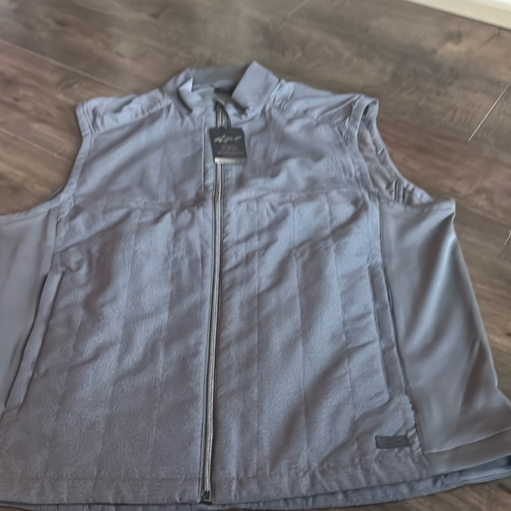 Brand new with tags and original packaging Greg Norman full zip vest extra large